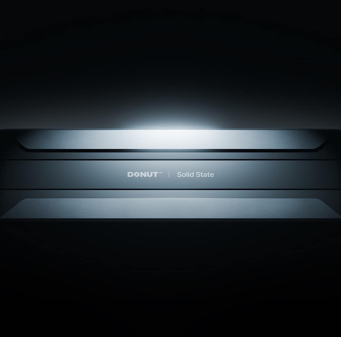 A sleek, futuristic electronic device labeled 